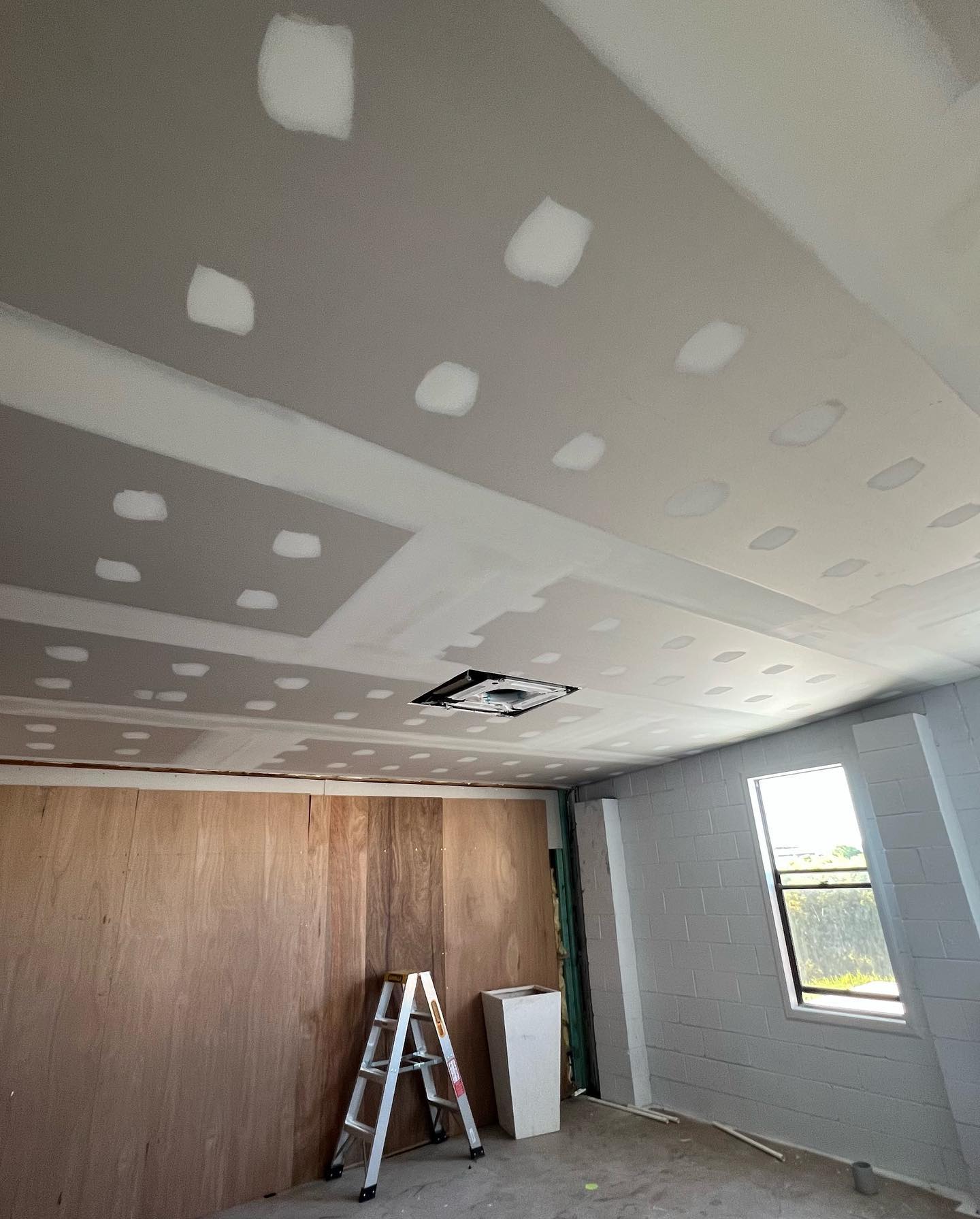 Bedroom — block wall to ceiling